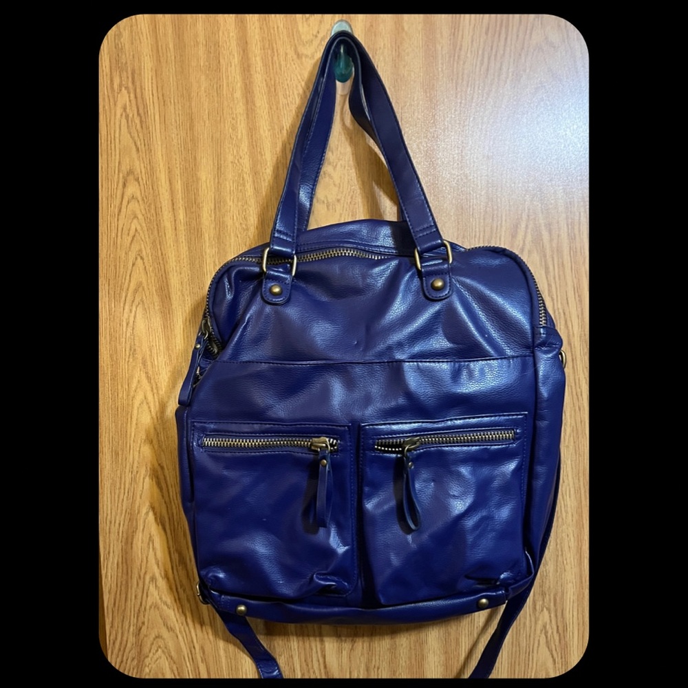 Retro purple messenger bag with TONS of storage!